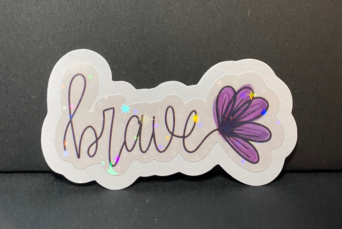 “Brave” holographic sticker